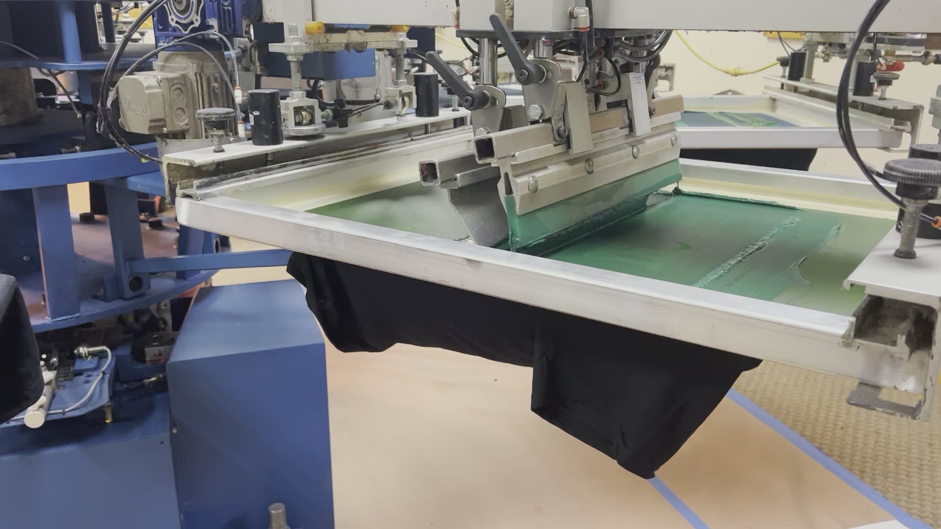 Load video: Here is our automated screenprinting equipment